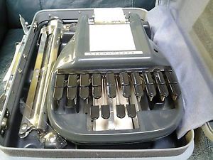 stenograph with samsonite case and tripod