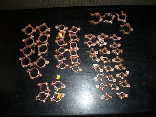 PHD COPPER HINGED SPLIT CLAMP HANGERS. (48). (9)1 1/4&#034;,(4)1&#034;,(12)3/4&#034; &amp; (23)1/2&#034;