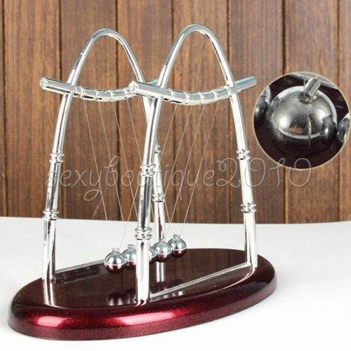 Newtons cradle balancing swinging metal balls plastic base toys desk accessories for sale