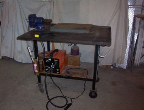 WELDING TABLE ON WHEELS W/ PRACTIC 110V WELDER,BOTTLE,VICE &amp; FORMING BLOCK