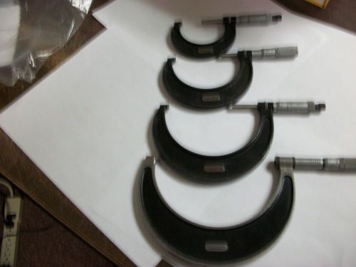 USED SET OF FOUR STARRETT MICROMETERS