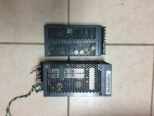 Two NEMIC-LAMBDA POWER SUPPLIES