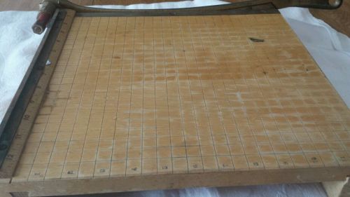 Wooden machete type paper cutter