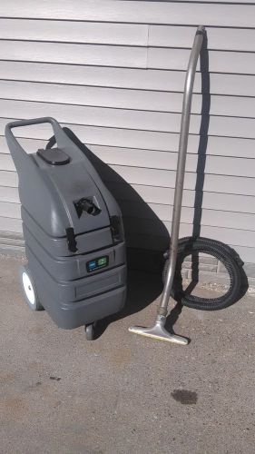 Tennant wd 15 wet dryvac with suction hose and wand  runs perfect. for sale